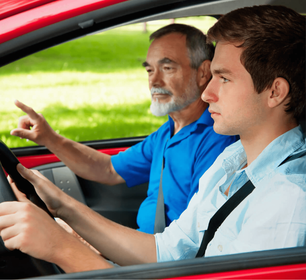 A new driver practising for the Ontario G1 knowledge test with a supervising driver